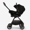Nuna triv passeggino with magnetic buckle riveted