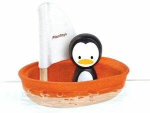 Plan toys barca a vela con pinguino 12m+