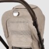 Nuna mixx next passeggino with magnetic buckle biscotti