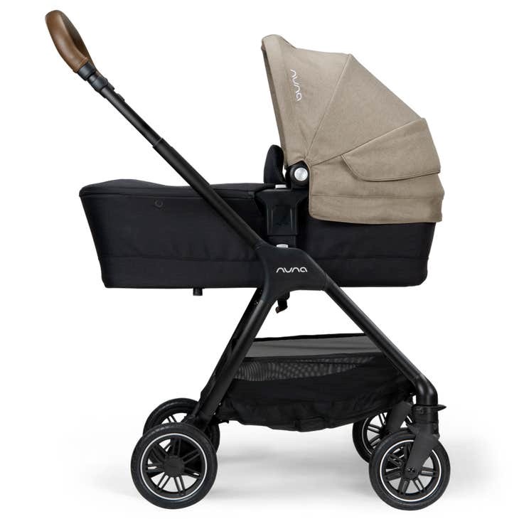 Nuna triv passeggino with magnetic buckle timber