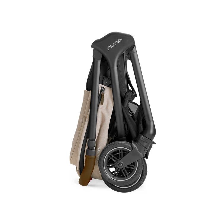 Nuna triv passeggino with magnetic buckle timber